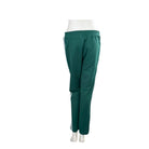 Green pants on a mannequin against a white background