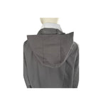 Grey raincoat hood on a mannequin with a white background