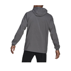 Person wearing a grey jacket with a hood on a white background