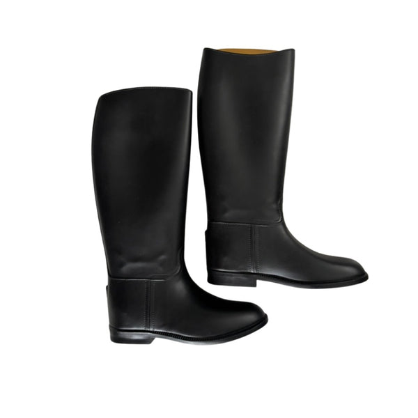 Pair of black riding boots on a white background