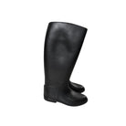 Black riding boots on a white background