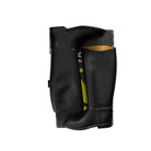 Black rubber boot with yellow interior on a white background