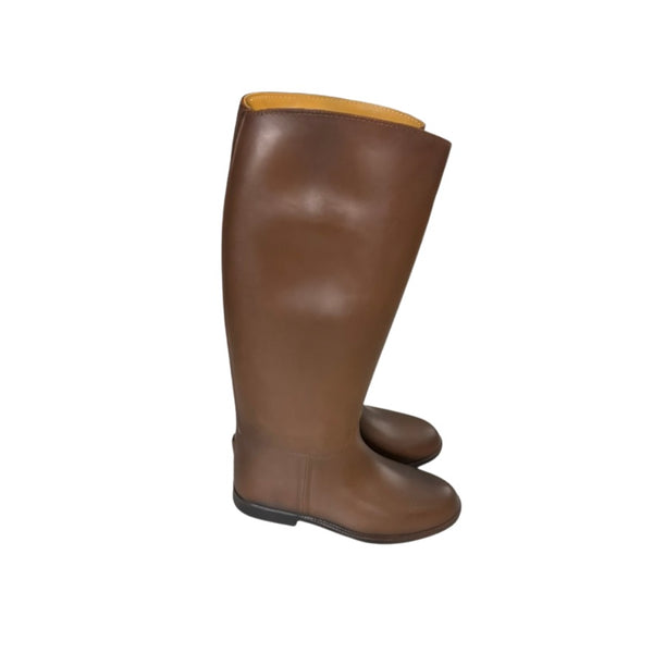 Brown knee-high boots on a white background