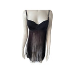 Black fringe dress on a mannequin against a white background