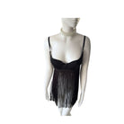 Black fringe dress on a mannequin with a white background
