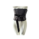 Black lace waist belt with a bow on a mannequin against a white background