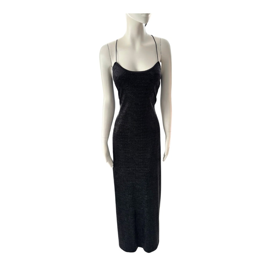 Black dress on a mannequin against a white background