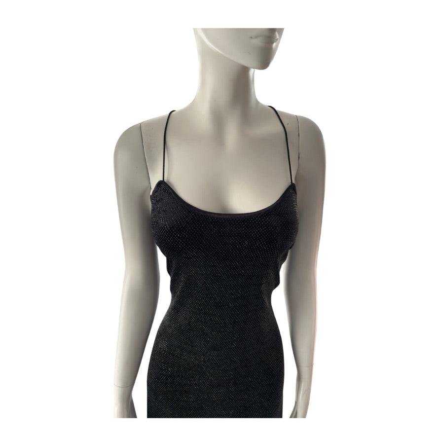 Black textured dress on a mannequin against a white background