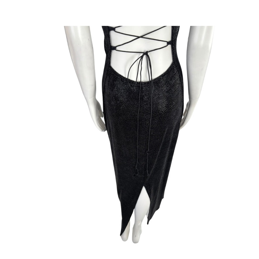 Black dress with criss-cross back design on a mannequin against a white background