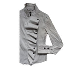 Black and white striped shirt with button details on a white background