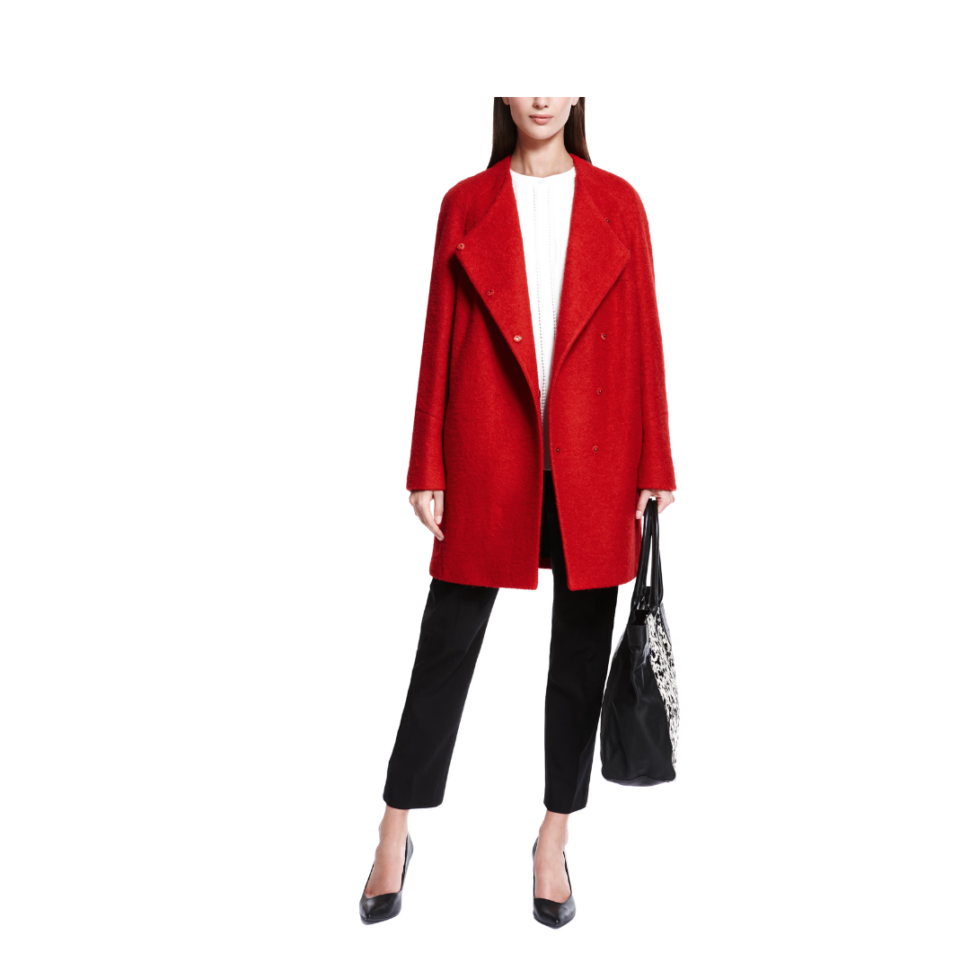 Person wearing a red coat on a white background
