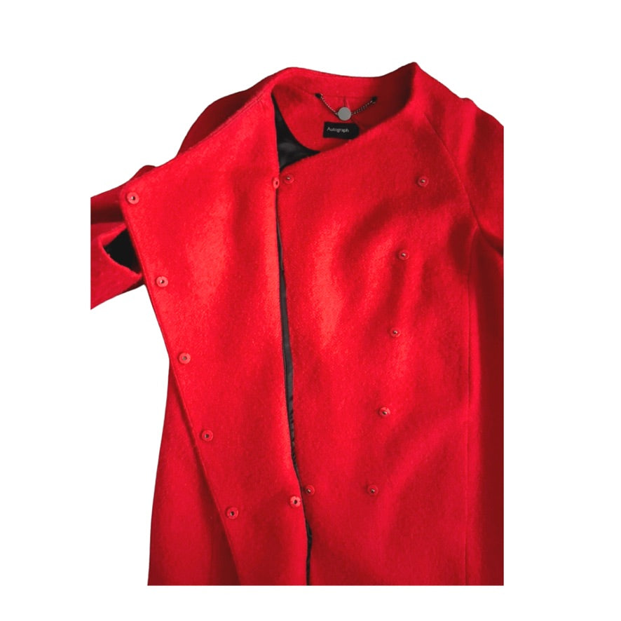 Red coat with black trim on a white background