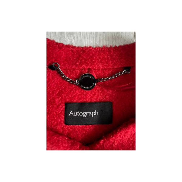 Red garment with 'Autograph' label on a white background