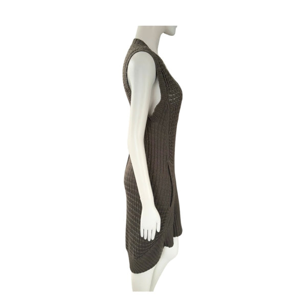 Mannequin wearing a khaki knitted dress on a white background
