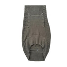 Knitted khaki dress hem on a white background