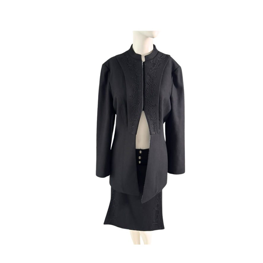 Black coat on a mannequin against a white background