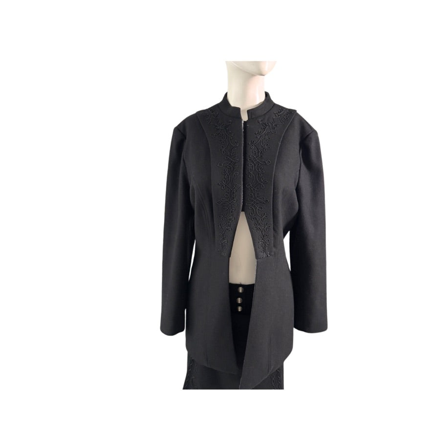 Black coat on a mannequin against a white background