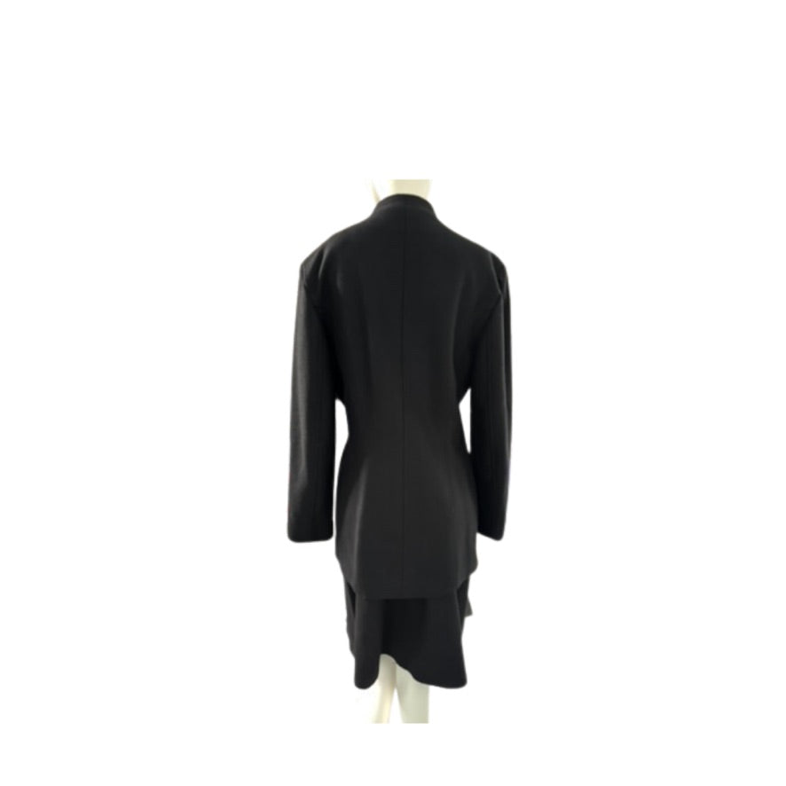 Black coat on a mannequin against a white background