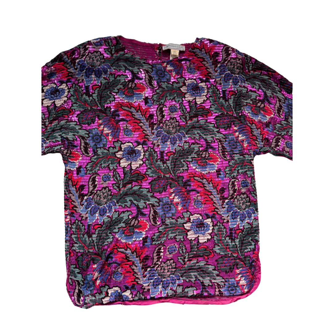 Floral patterned top on a white background