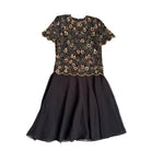 Black dress with gold lace top on a white background