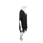 Black lace dress on a mannequin against a white background