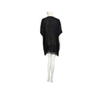 Black dress on a mannequin against a white background