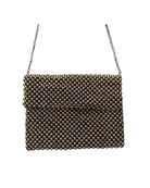 Beaded handbag with chain strap on a white background