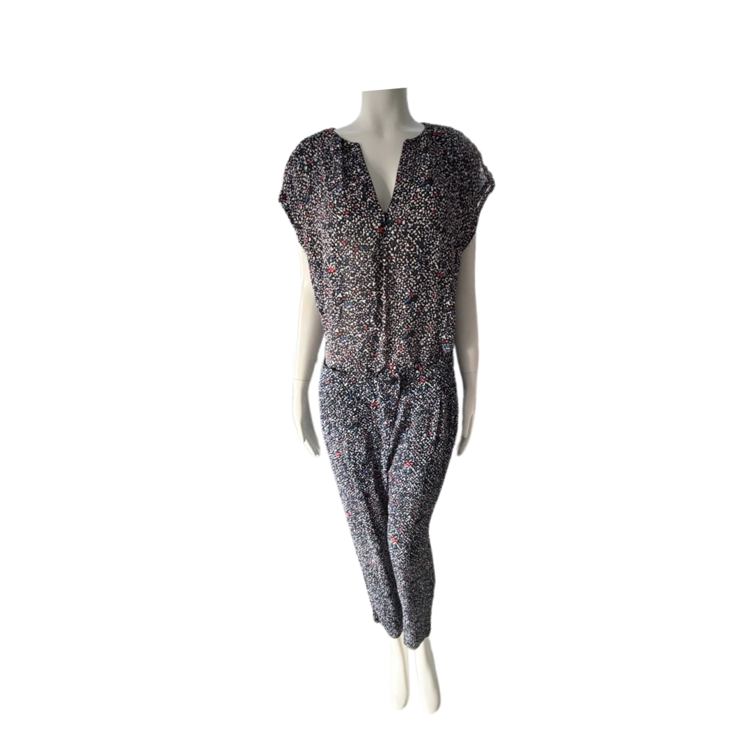 Mannequin wearing a patterned jumpsuit on a white background