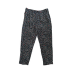 Black speckled pants on a white background