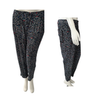 patterned pants on mannequins against a white background