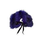 Blue fluffy headband with a black ribbon on a white background