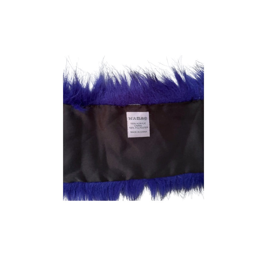 Close-up of a fur product with blue and white fringes on a white background