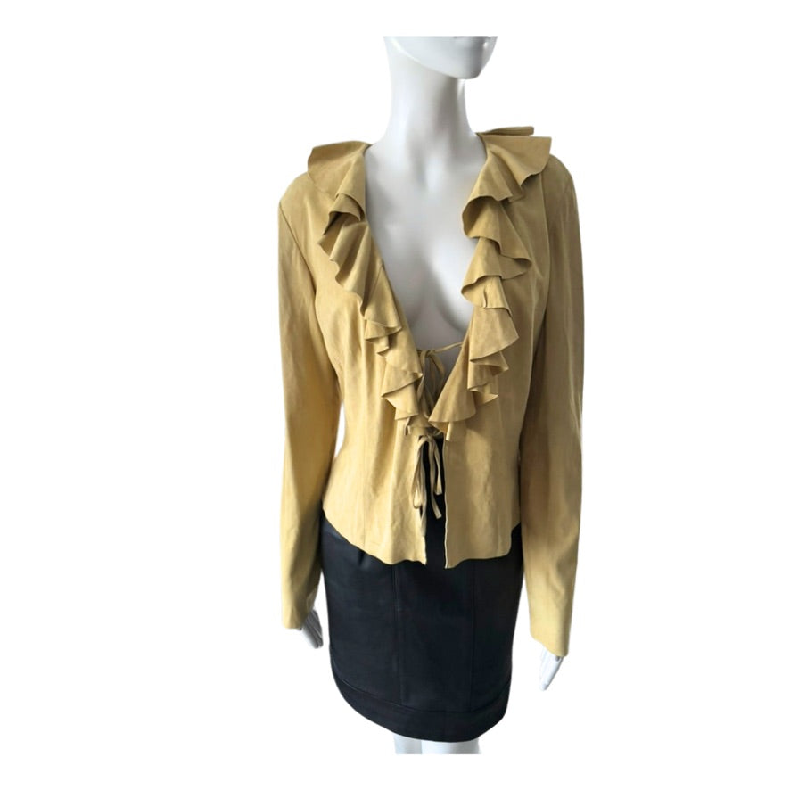 Mannequin wearing a beige ruffled blouse with a black skirt on a white background