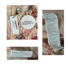 Boohoo clothing tags and labels on a garment with sequins.