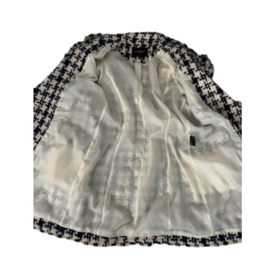 White shirt with black and white checkered collar on a white background