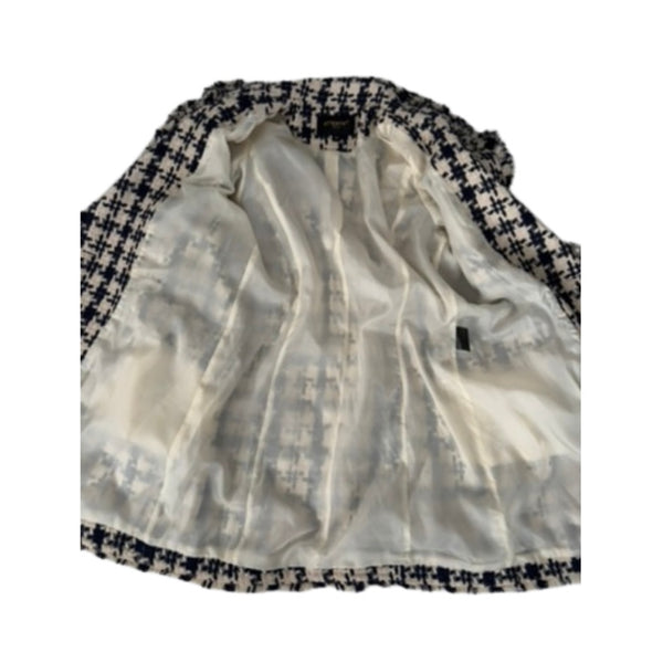 White shirt with black and white checkered collar on a white background