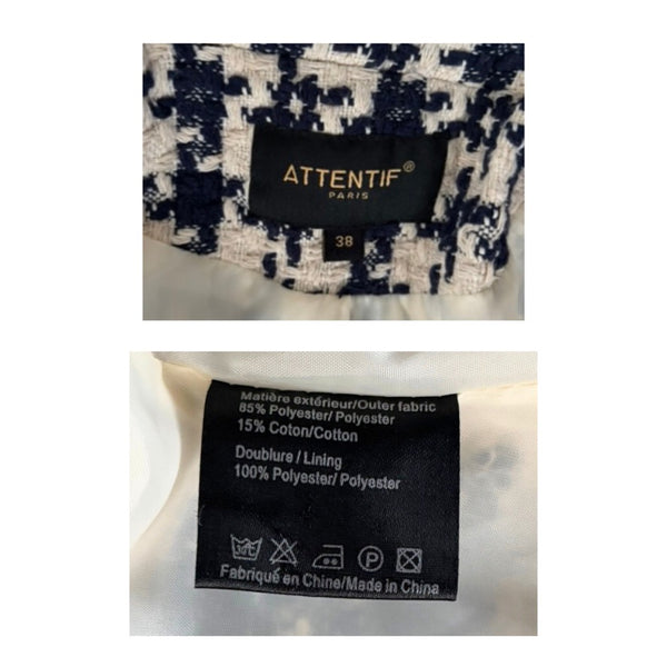 Attentif Paris clothing label with fabric composition details on a white background