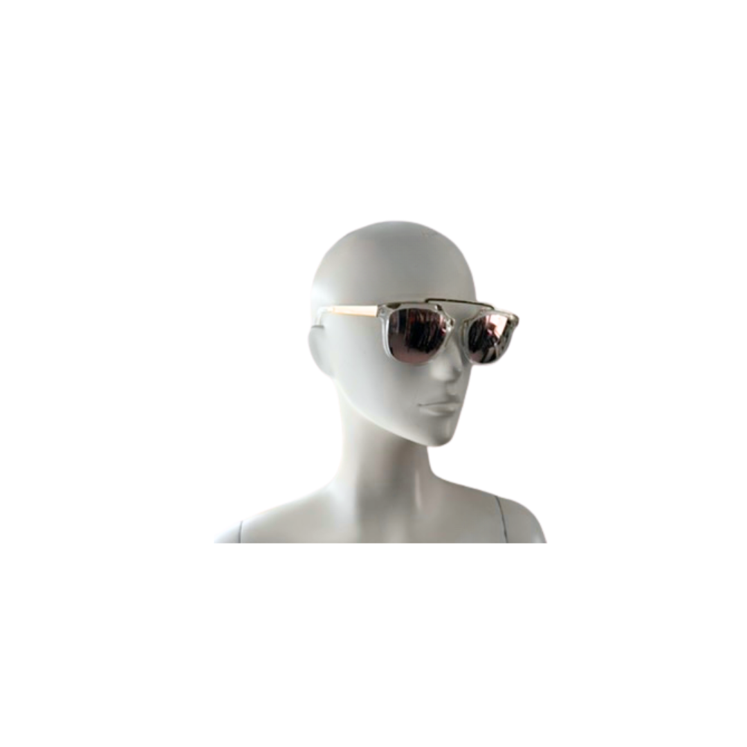 Mannequin head wearing sunglasses on a white background