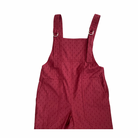 Red textured overalls on a white background