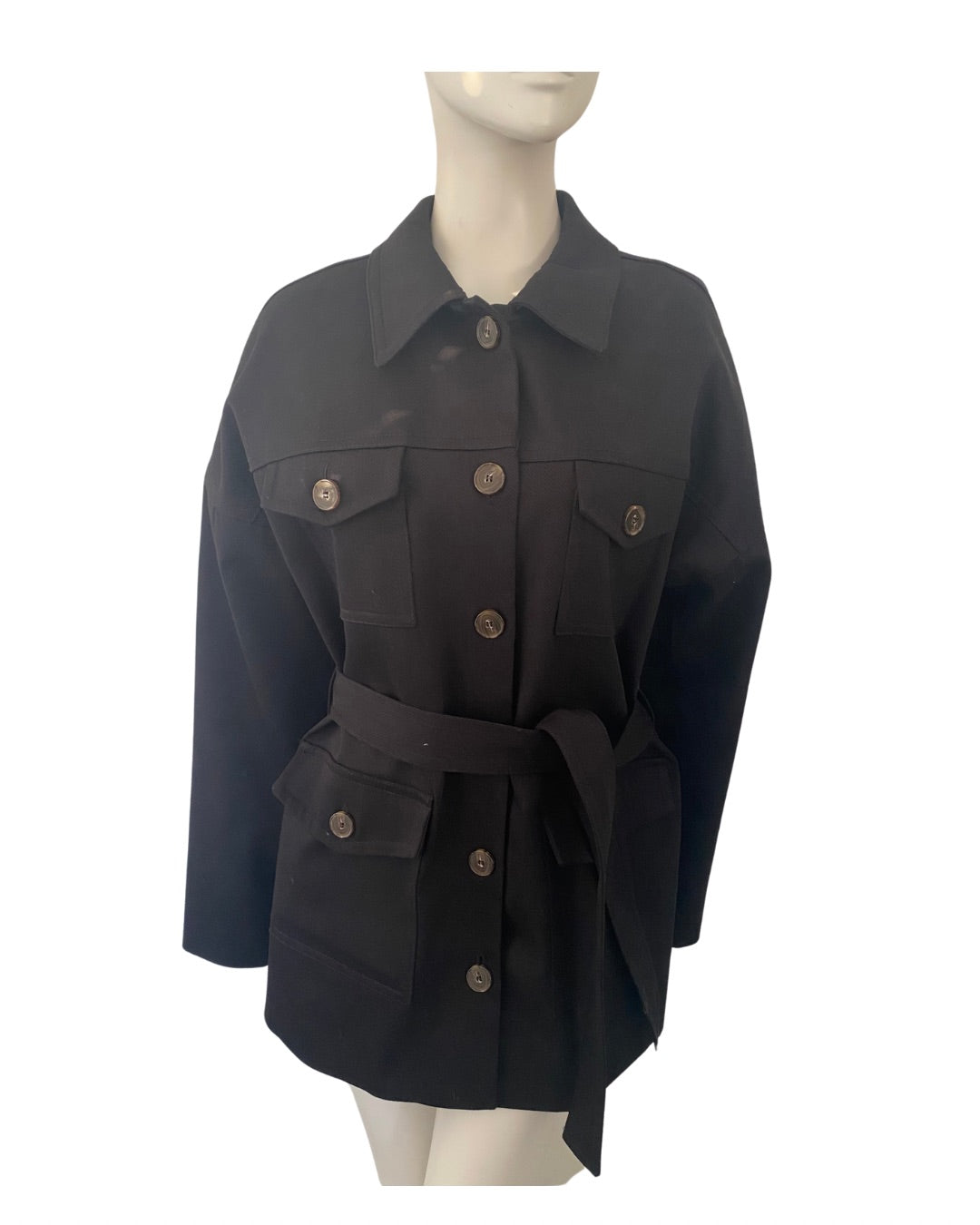 Black jacket with buttons on a mannequin against a white background