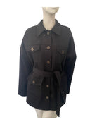 Black jacket with buttons on a mannequin against a white background