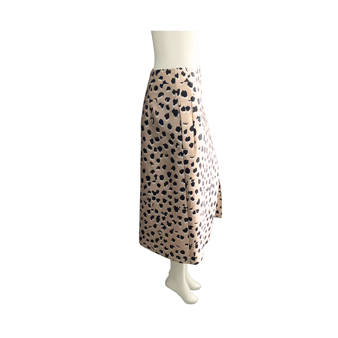 Mannequin wearing a leopard print skirt on a white background