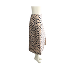Mannequin wearing a leopard print skirt on a white background