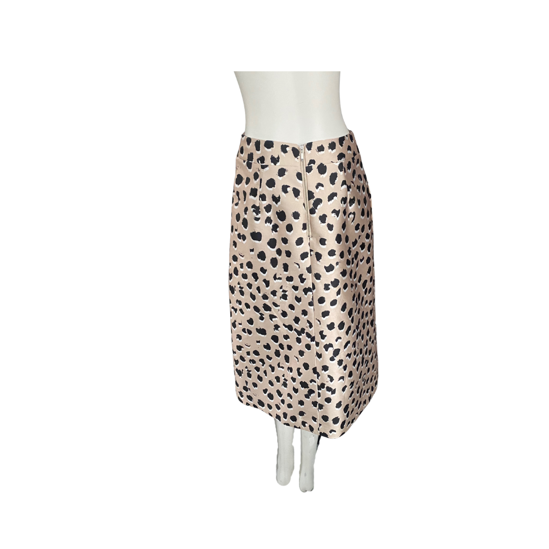Skirt with cheetah pattern on a mannequin against a white background