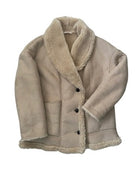 Beige shearling jacket with black buttons on a white background