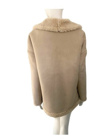 Beige jacket with fur collar on a mannequin against a white background