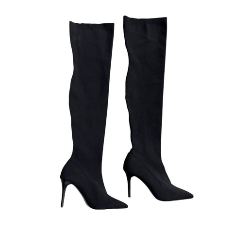 Black knee-high boots on a white background