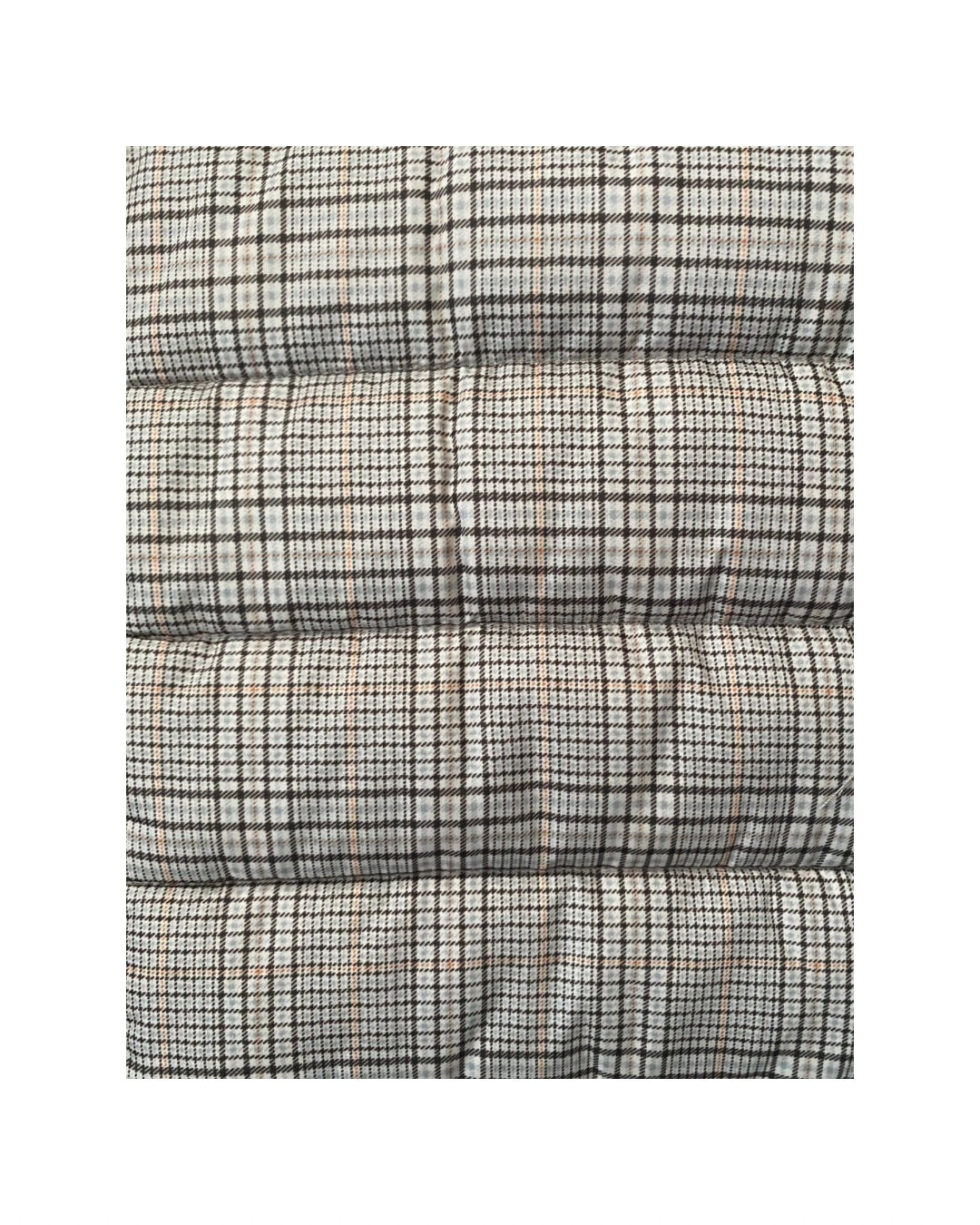Plaid patterned fabric on a white background