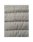 Plaid patterned fabric on a white background