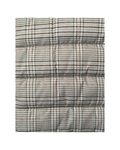 Plaid patterned fabric on a white background